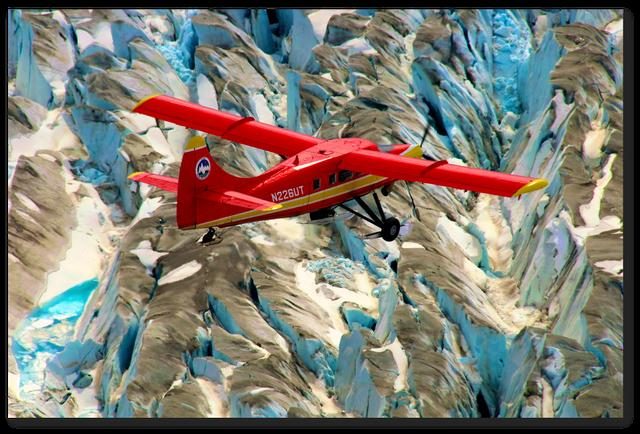 NASA aircraft conducting climate research over the Arctic, studying environmental changes and their global impacts.