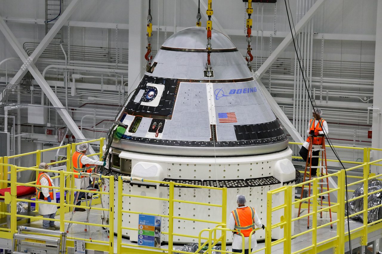 Boeing CST-100 Starliner spacecraft docked at International Space Station for test flight.