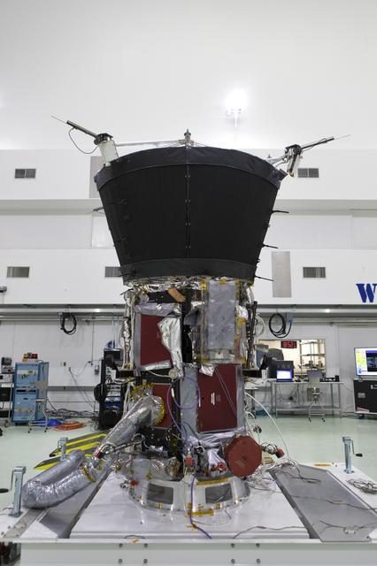 The Parker Solar Probe's antenna fully deployed against a backdrop of space, showcasing its intricate engineering and design.