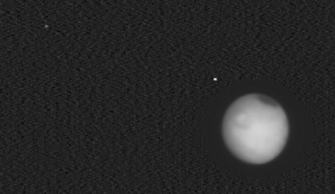 Infrared image of Mars and its moons Phobos and Deimos, captured by NASA's Europa Clipper.