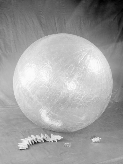 Echo 30 sub satellite displayed in a museum setting with informational placard.
