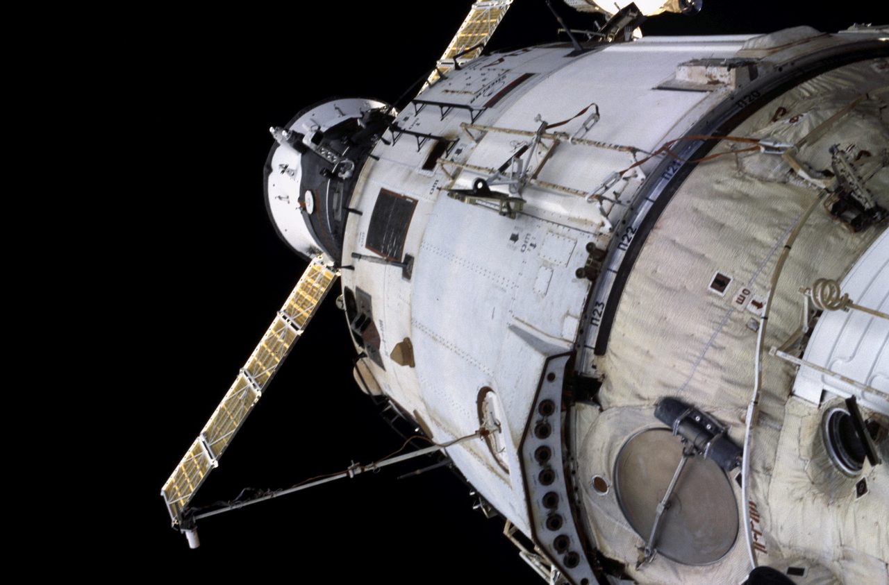 Astronauts conduct spacewalk near the nadir side of the International Space Station during Expedition Three.