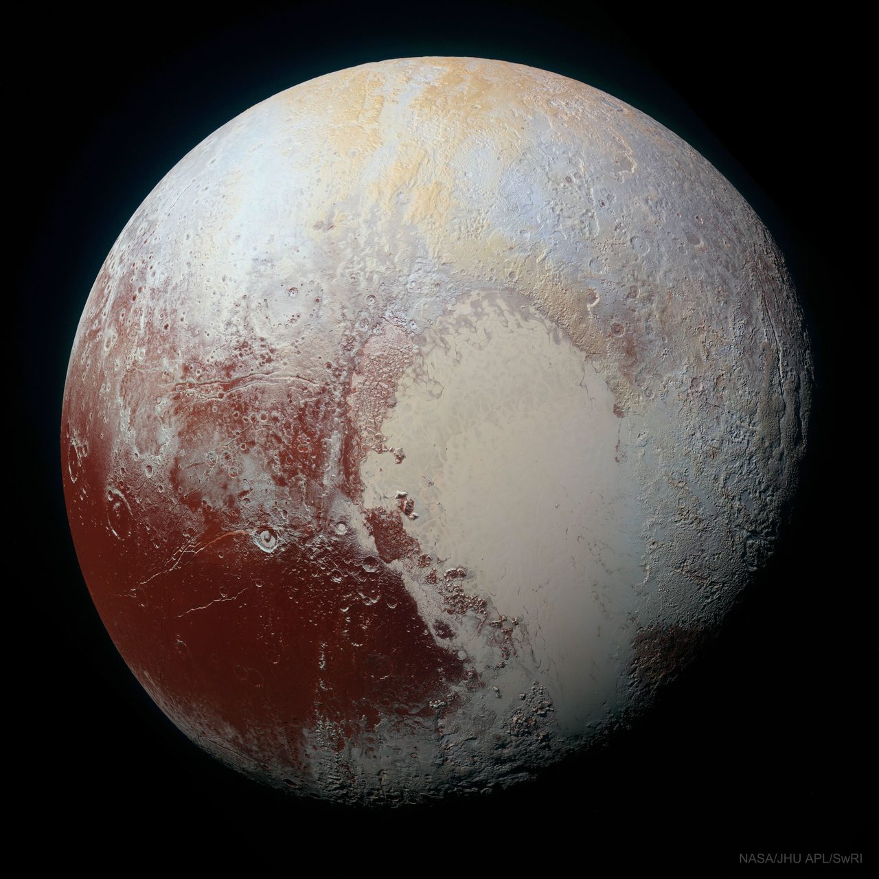Enhanced color image of Pluto showcasing its diverse surface features and subtle color variations.
