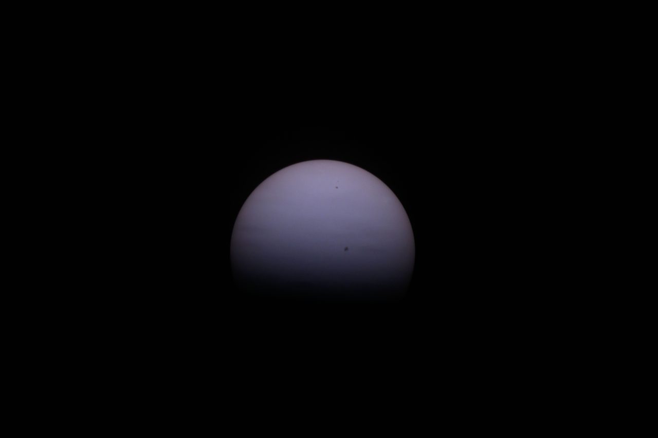 View of the 2024 solar eclipse casting a shadow on Earth from space.