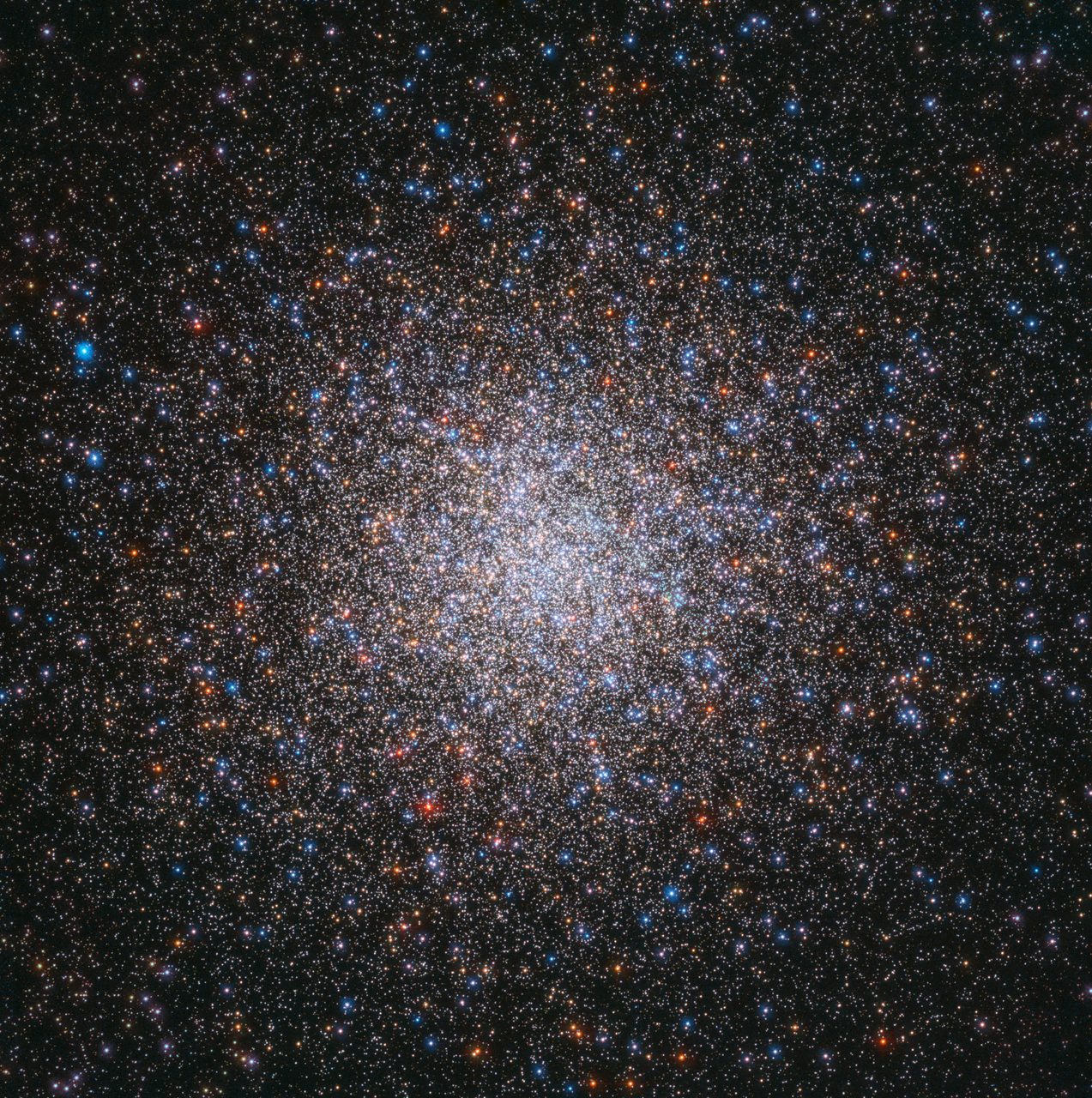 A dense star cluster, Messier 2, glowing brightly against the dark expanse of space.