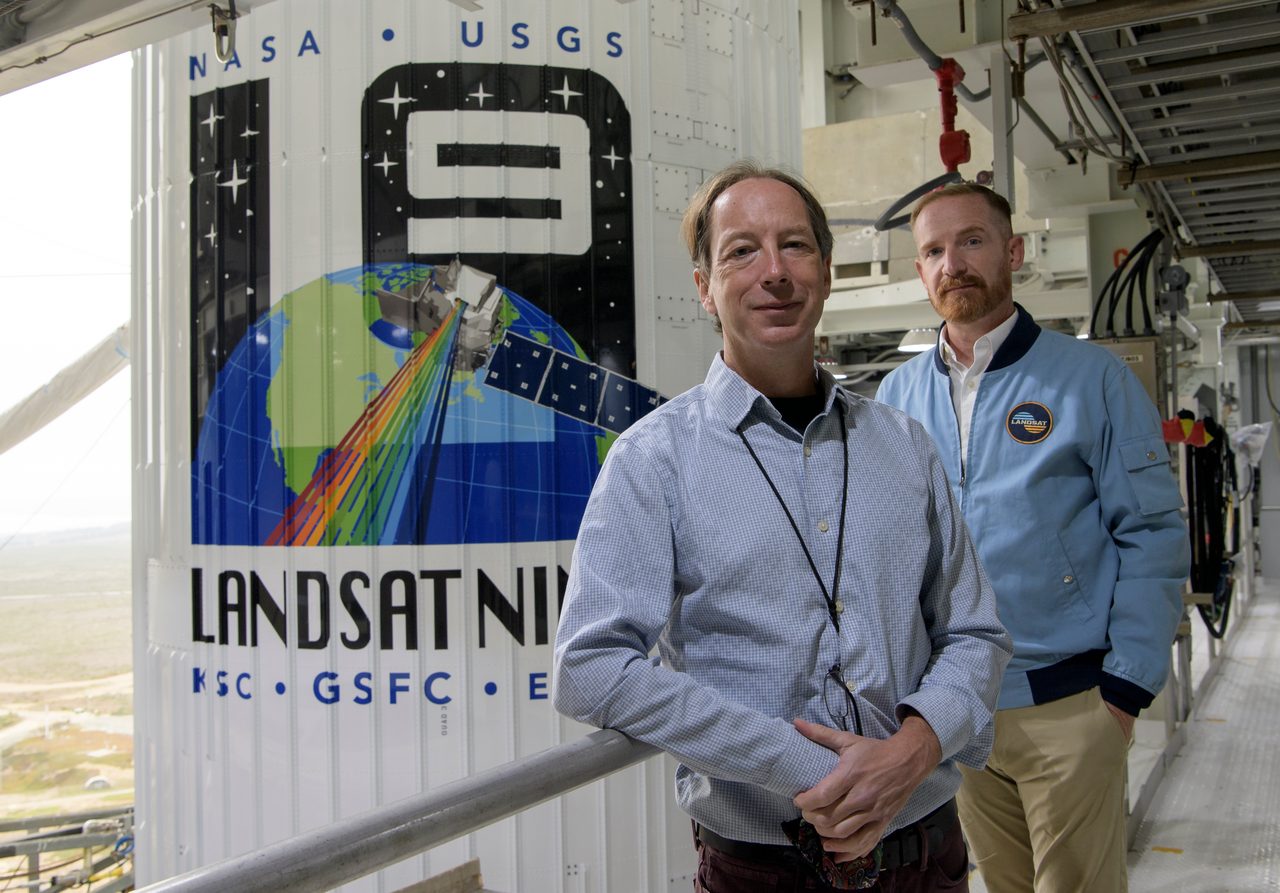 Landsat 9 spacecraft on launch pad with clear blue sky background, ready for its mission.