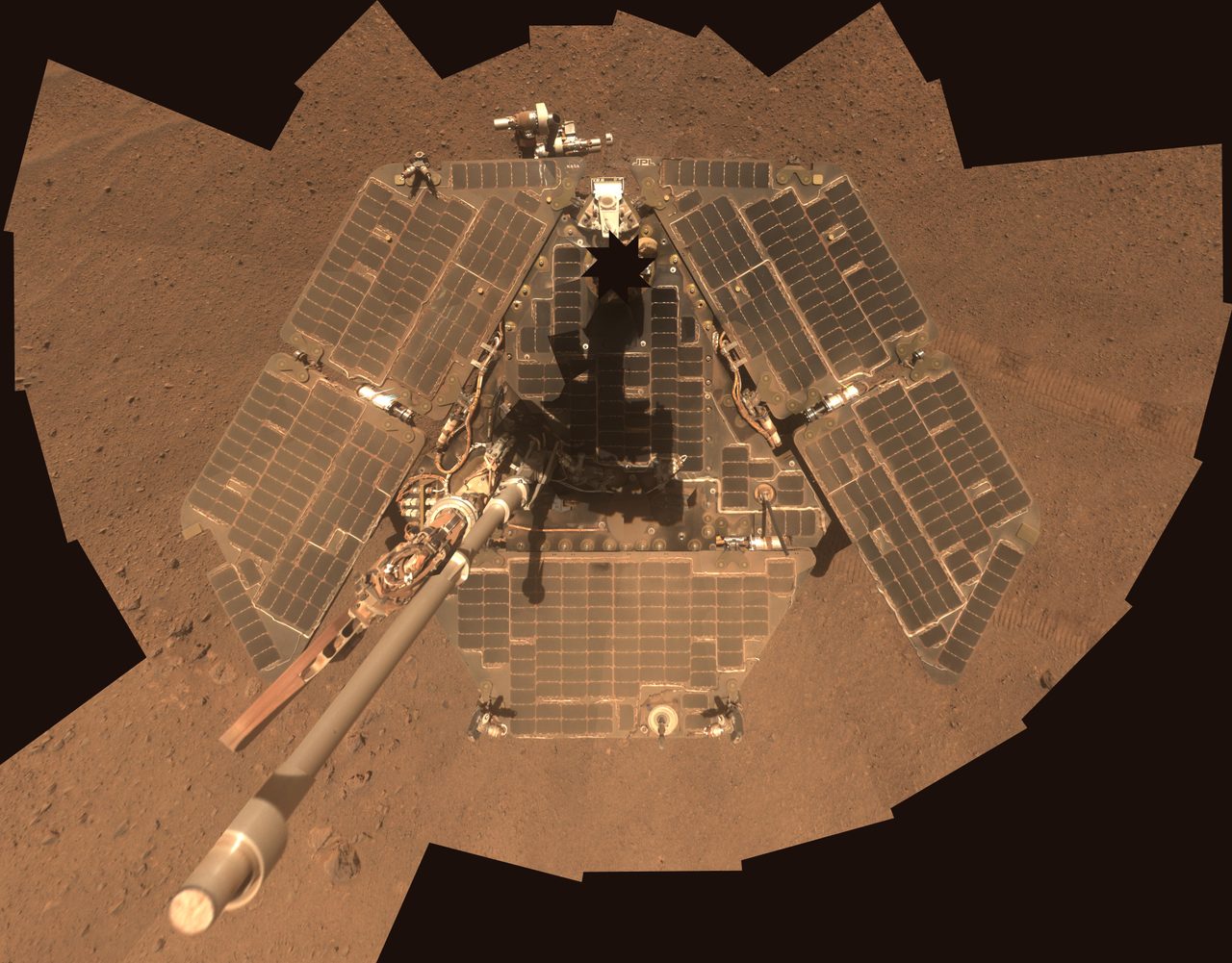 Opportunity Mars Rover's self-portrait in March 2014, showing cleaner solar arrays after recent wind activity.