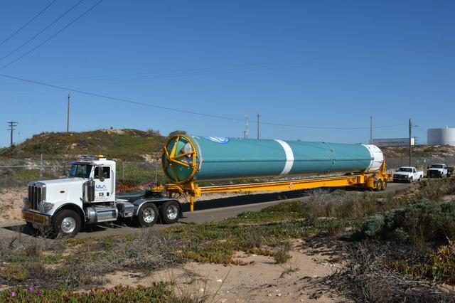 Delta II rocket booster being transported for the ICESat-2 satellite mission.