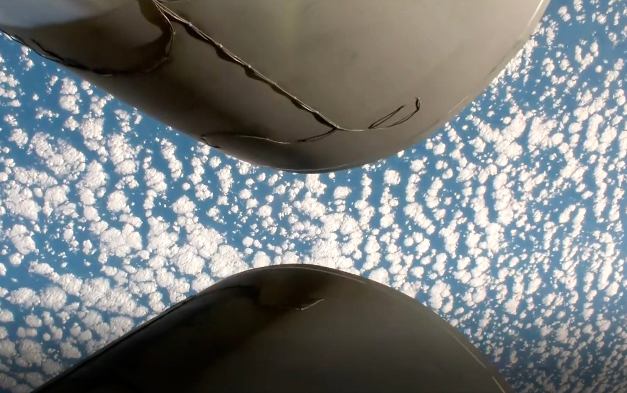 NASA's ESCAPADE mission launching on Blue Origin's New Glenn rocket under a clear blue sky