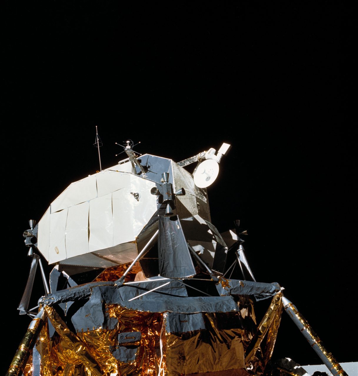 Apollo 16 Lunar Module resting on the Moon's surface, surrounded by gray lunar terrain.