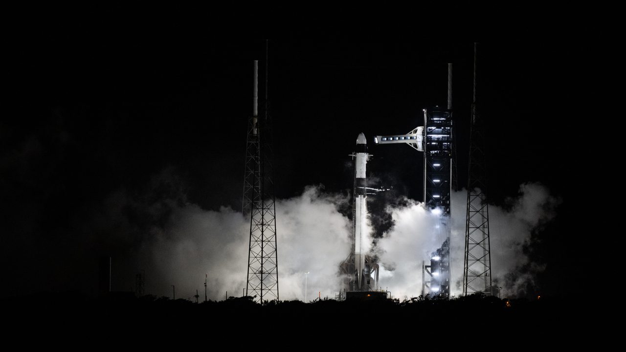 SpaceX Crew-9 Falcon 9 rocket undergoing final engine firing test before launch at Kennedy Space Center.