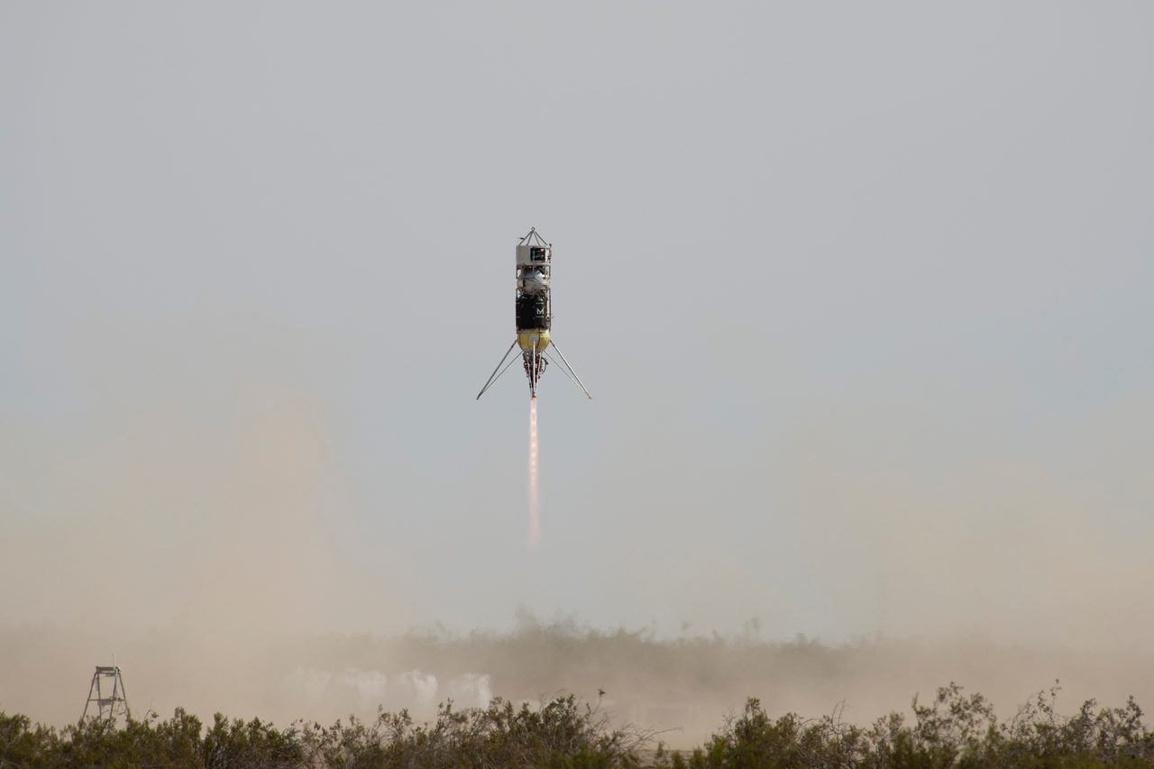Rocket launching vertically with smoke trail, testing lunar precision landing technology by Masten