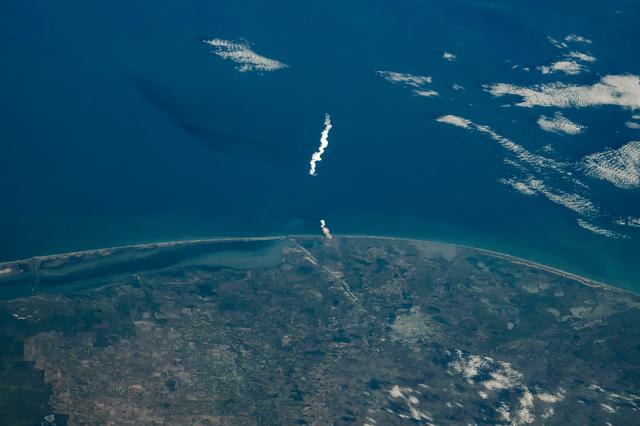 SpaceX Starship 6 rocket launching into space, viewed from the International Space Station.