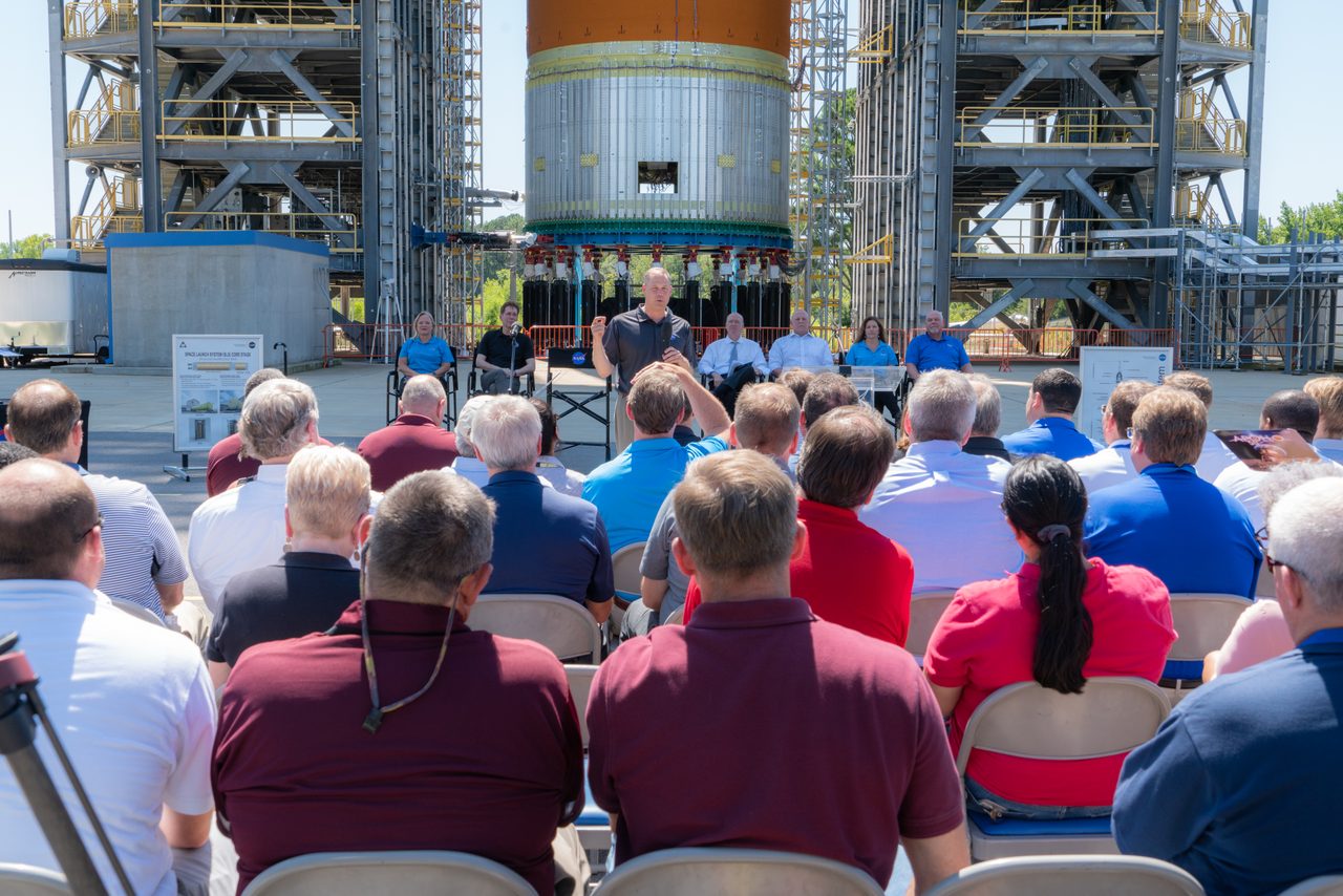 NASA Marshall Center engineers discussing Artemis lunar lander development in a laboratory setting