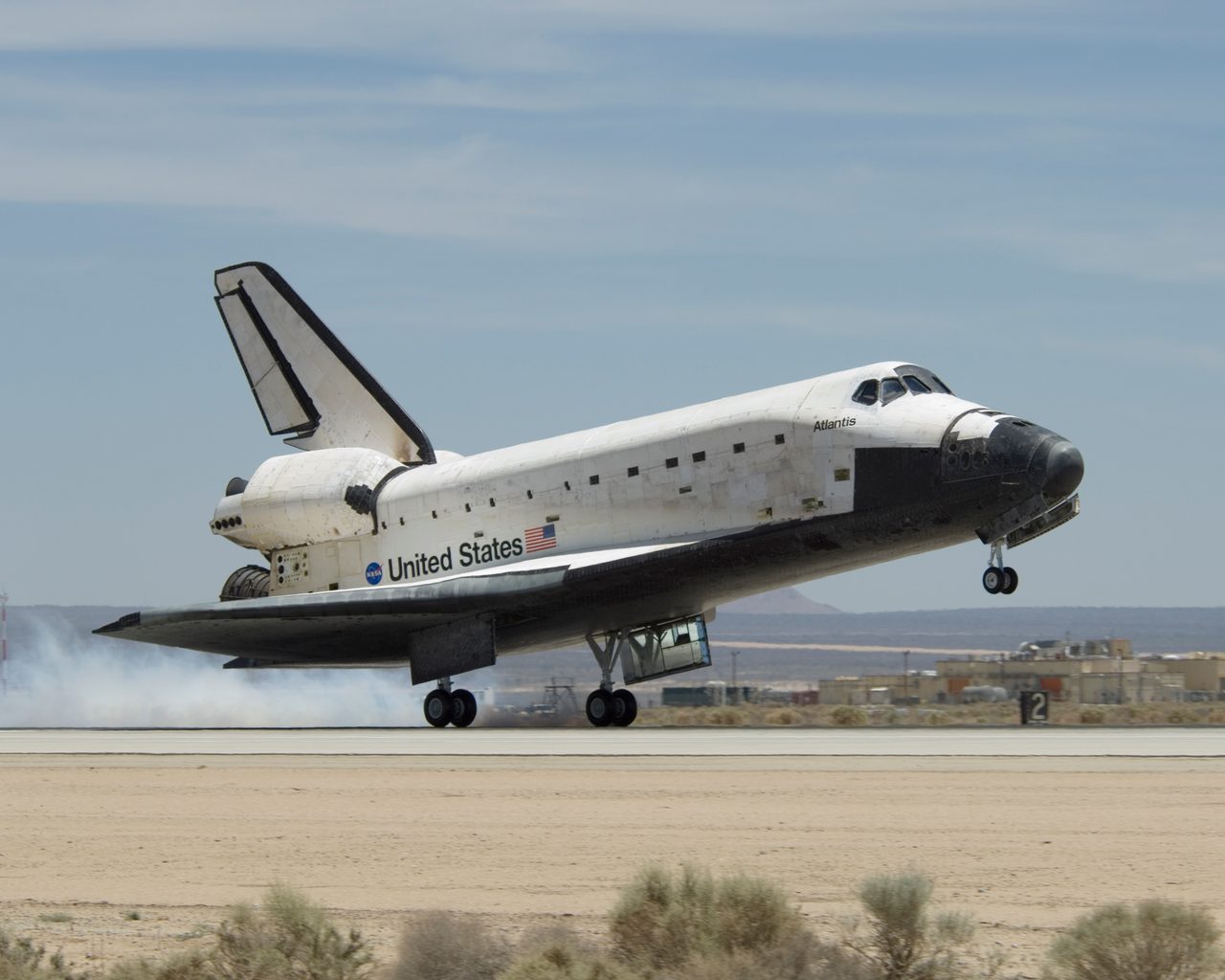 Space Shuttle Atlantis landing on runway at Edwards Air Force Base after completing mission STS-117.