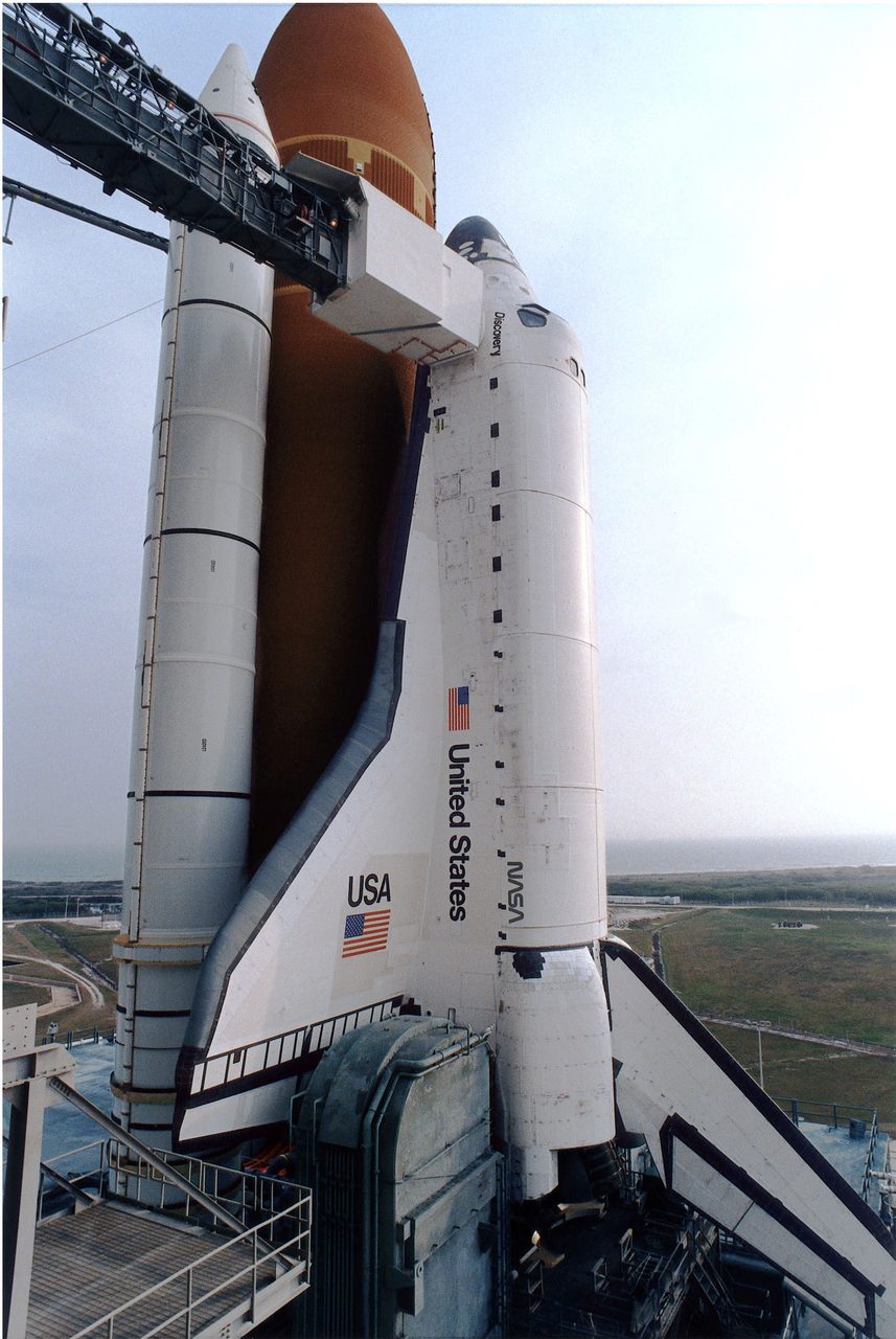 Space Shuttle Discovery on Launch Pad 39A, ready for STS-82 mission to service Hubble Space Telescope.