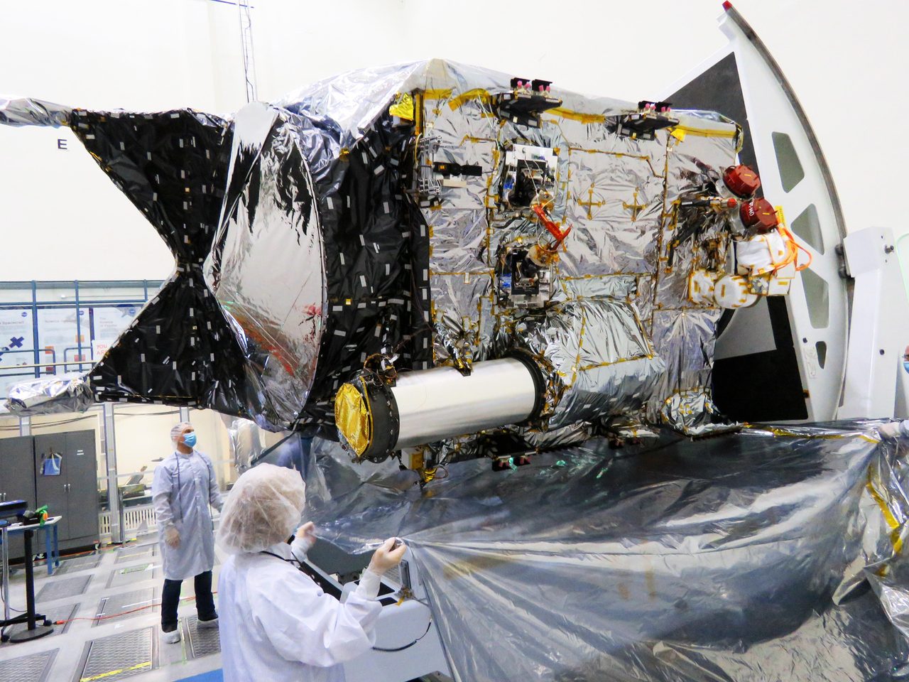 NASA's Psyche spacecraft featuring the DSOC flight laser transceiver, highlighted in a December 2021 photograph.