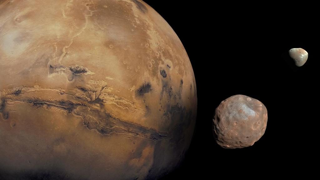 Mars accompanied by its two cratered moons, Phobos and Deimos, orbiting the planet in space.
