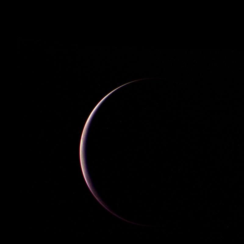 NASA Voyager 2's image of Triton, Neptune's largest moon, captured after closest approach in August 1989.