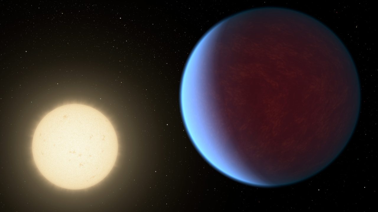 Artist's concept of super-Earth exoplanet 55 Cancri e with a thick atmosphere and nearby star.
