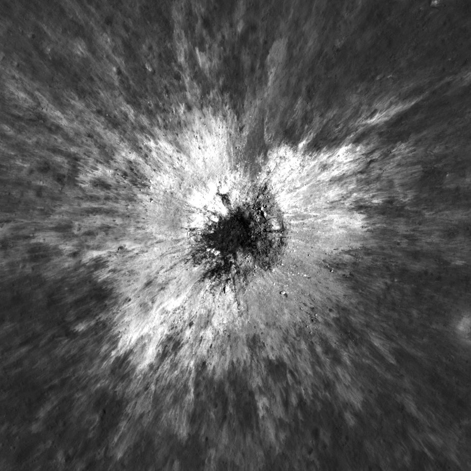 A detailed view of the newly discovered McGetchin lunar crater with rugged edges and shadowed interior.