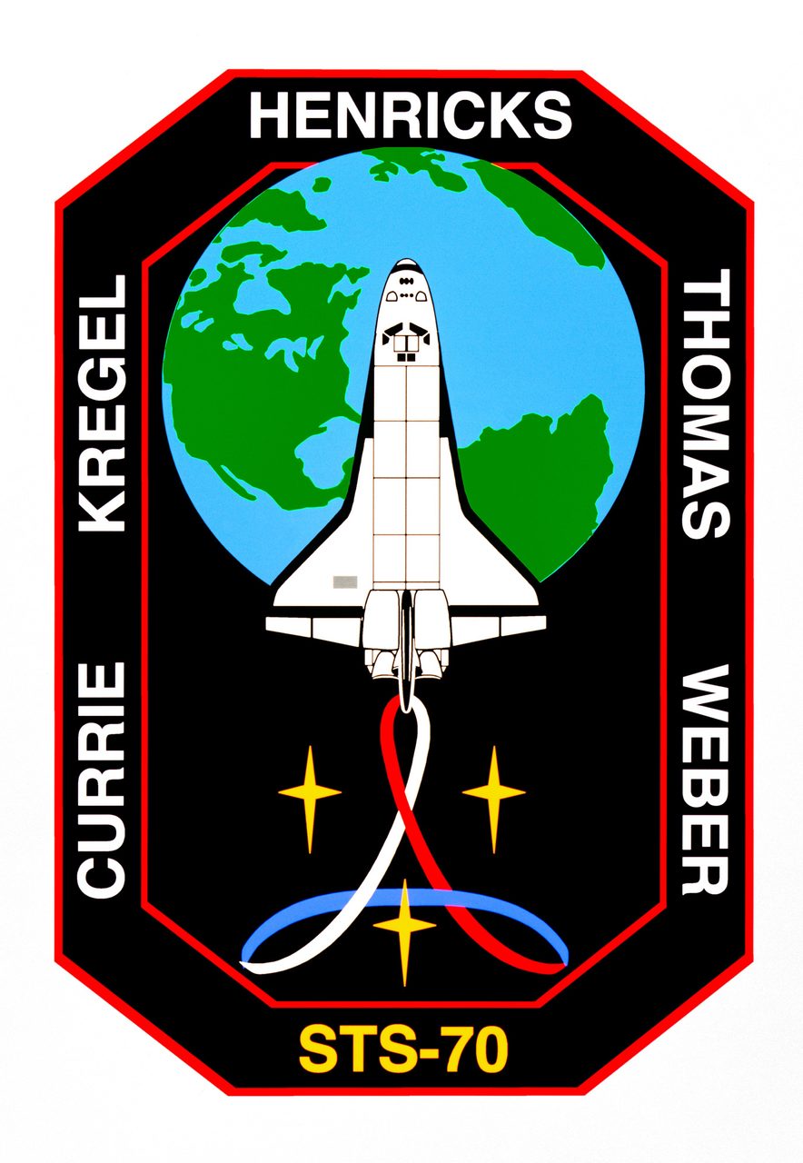 Colorful STS-70 mission patch featuring bald eagle and American flag with shuttle orbiting Earth.