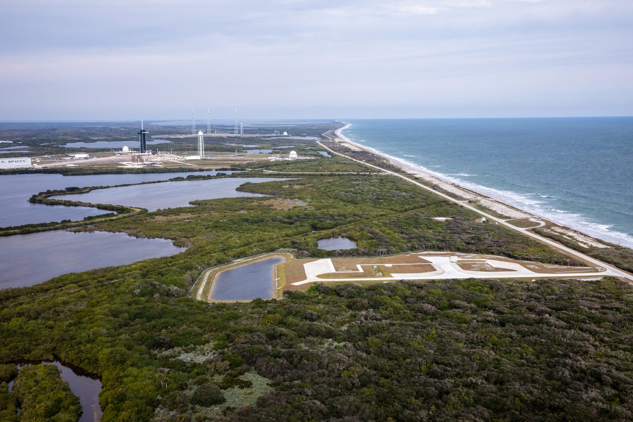 Aerial view of Launch Complex 48 with surrounding infrastructure and clear skies.