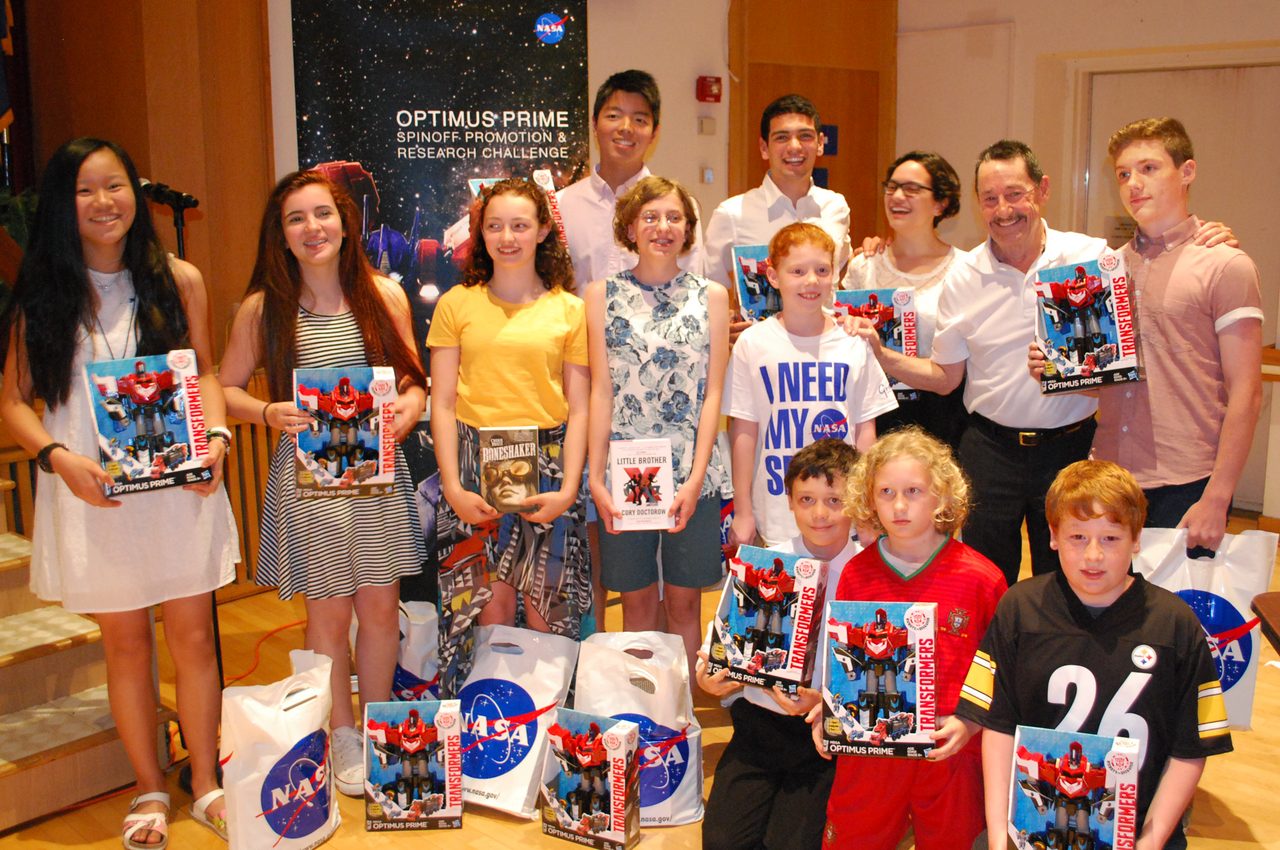 Group of students celebrating their win at NASA Goddard's OPTIMUS PRIME Challenge.