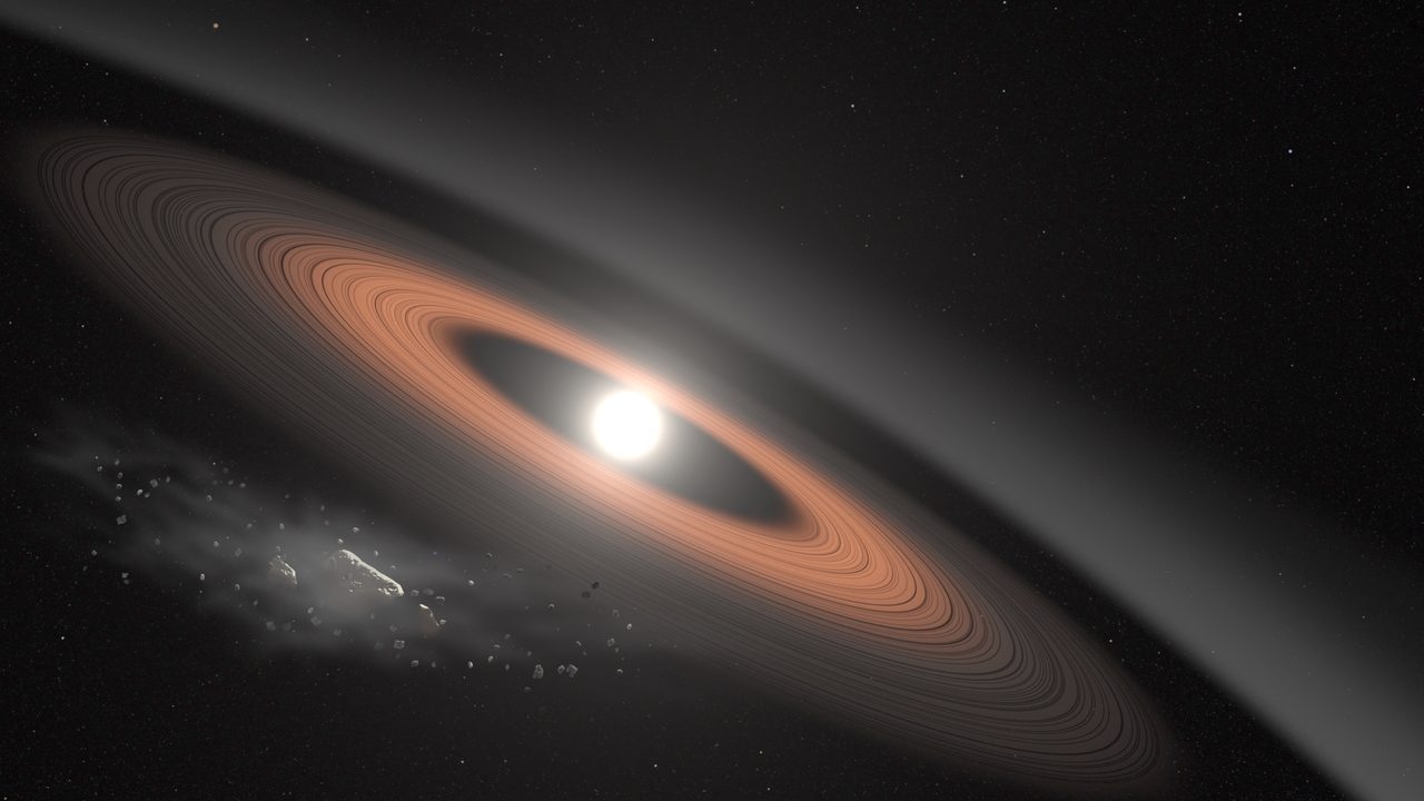 Illustration of an ancient white dwarf star with rings of debris from a disintegrating asteroid.