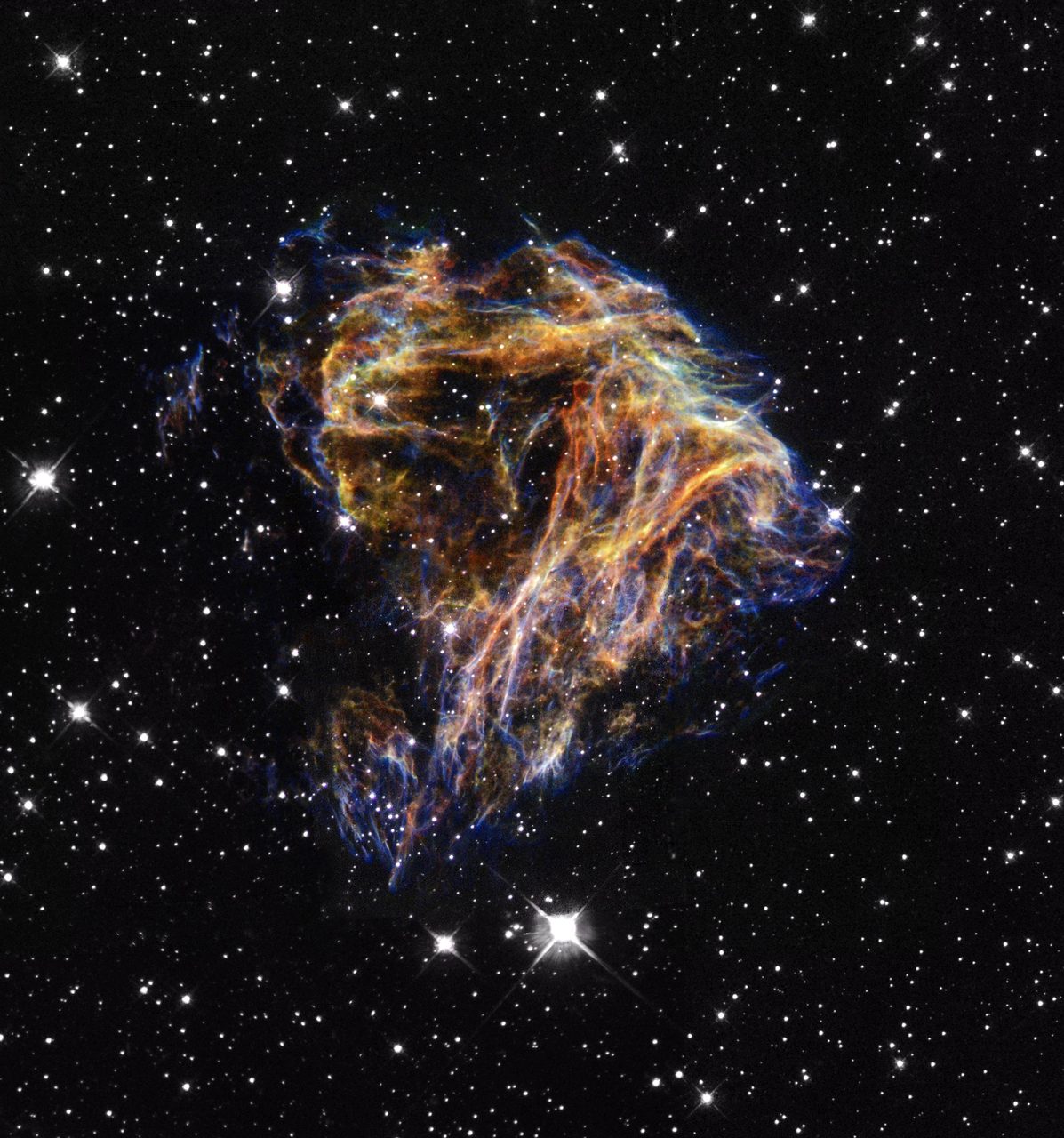 Hubble Space Telescope orbiting Earth with a backdrop of stars and distant galaxies.