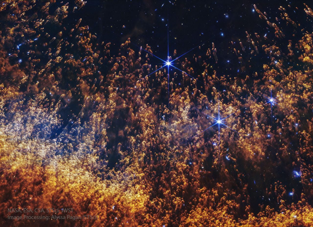 A vibrant image of the Helix Nebula showcasing intricate cometary knots against a starry backdrop.