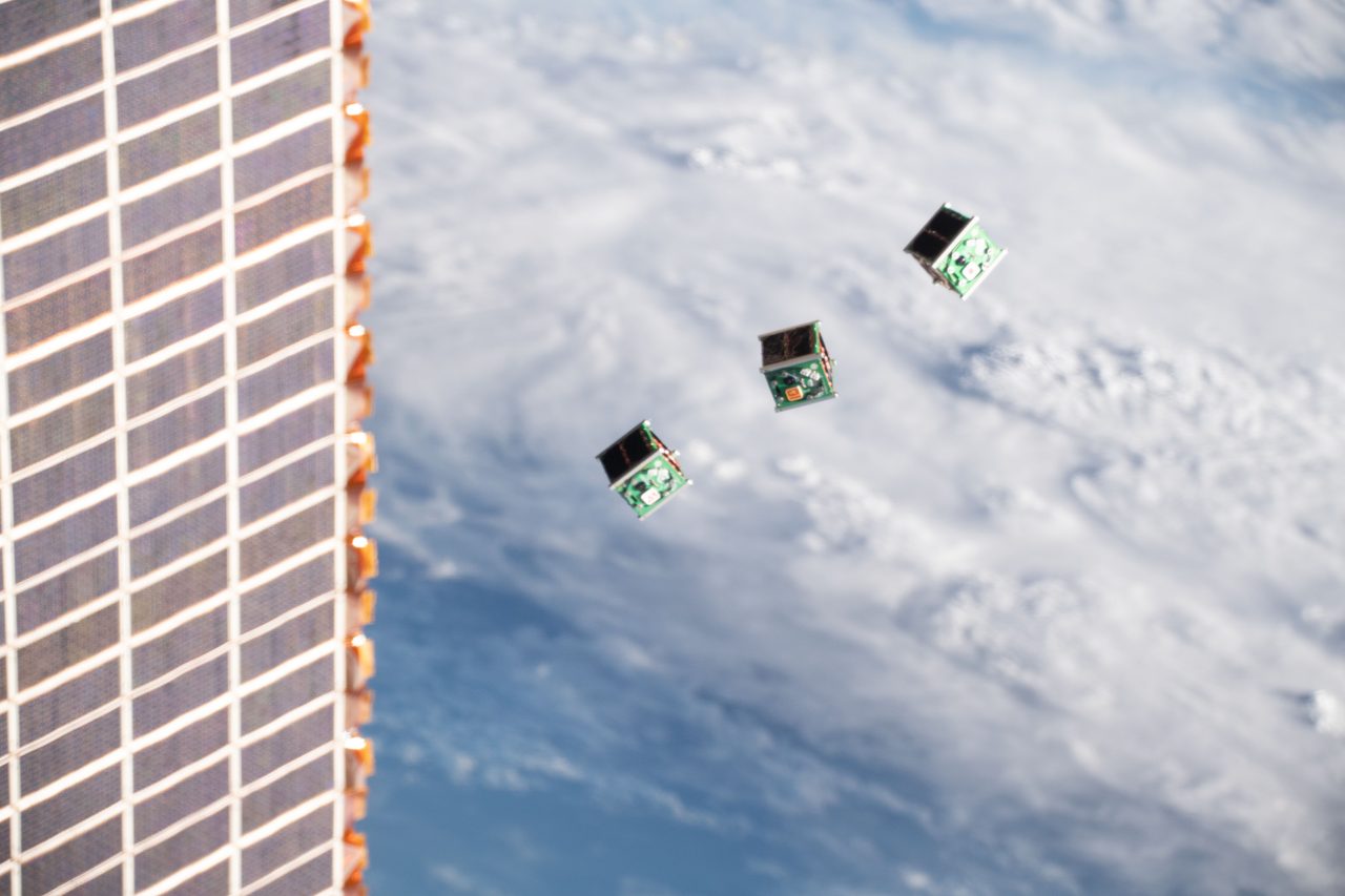 A micro-satellite being deployed into space by the JEM Small Satellite Orbital Deployer #11.