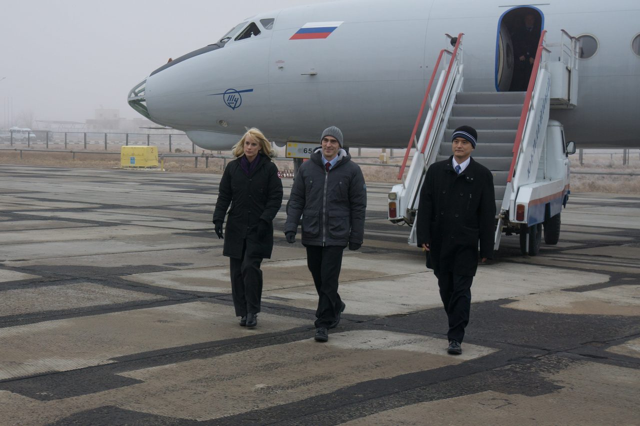 The Expedition 46-47 backup crewmembers arrive in Baikonur, Kazakhstan Nov. 30 for final pre-launch preparations. Kate Rubins of NASA (left), Anatoly Ivanishin of the Russian Federal Space Agency (Roscosmos, center) and Takuya Onishi of the Japan Aerospace Exploration Agency (JAXA, right) will serve as backups to the prime crewmembers, Tim Peake of the European Space Agency, Yuri Malenchenko of th