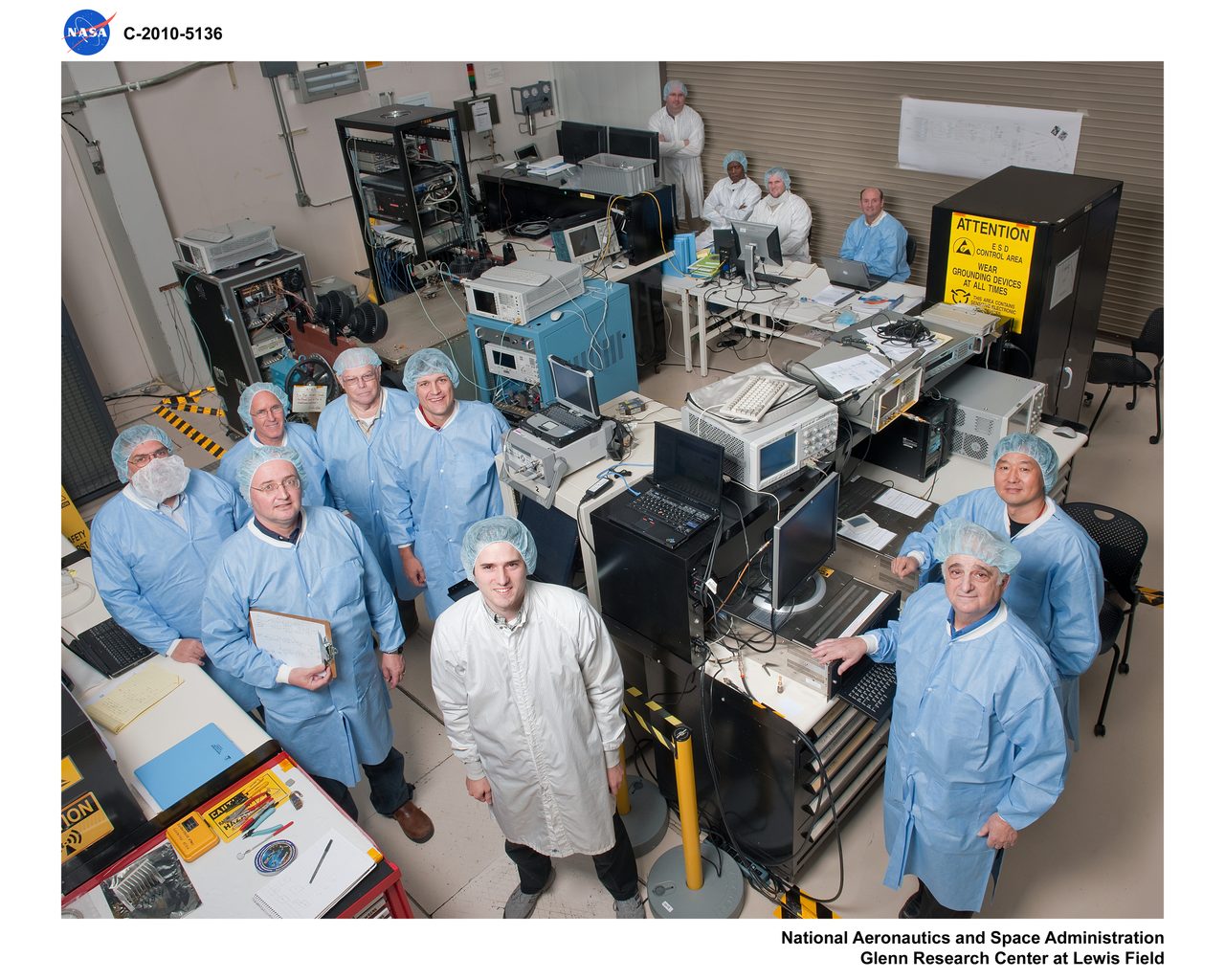 NASA Glenn Research Center wind tunnel test with aircraft model and measurement equipment.