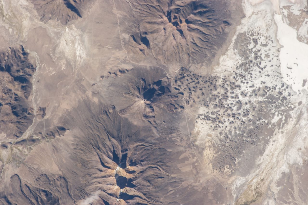 View of Earth from space showing diverse landscapes and cloud formations, captured by Expedition 35 crew.