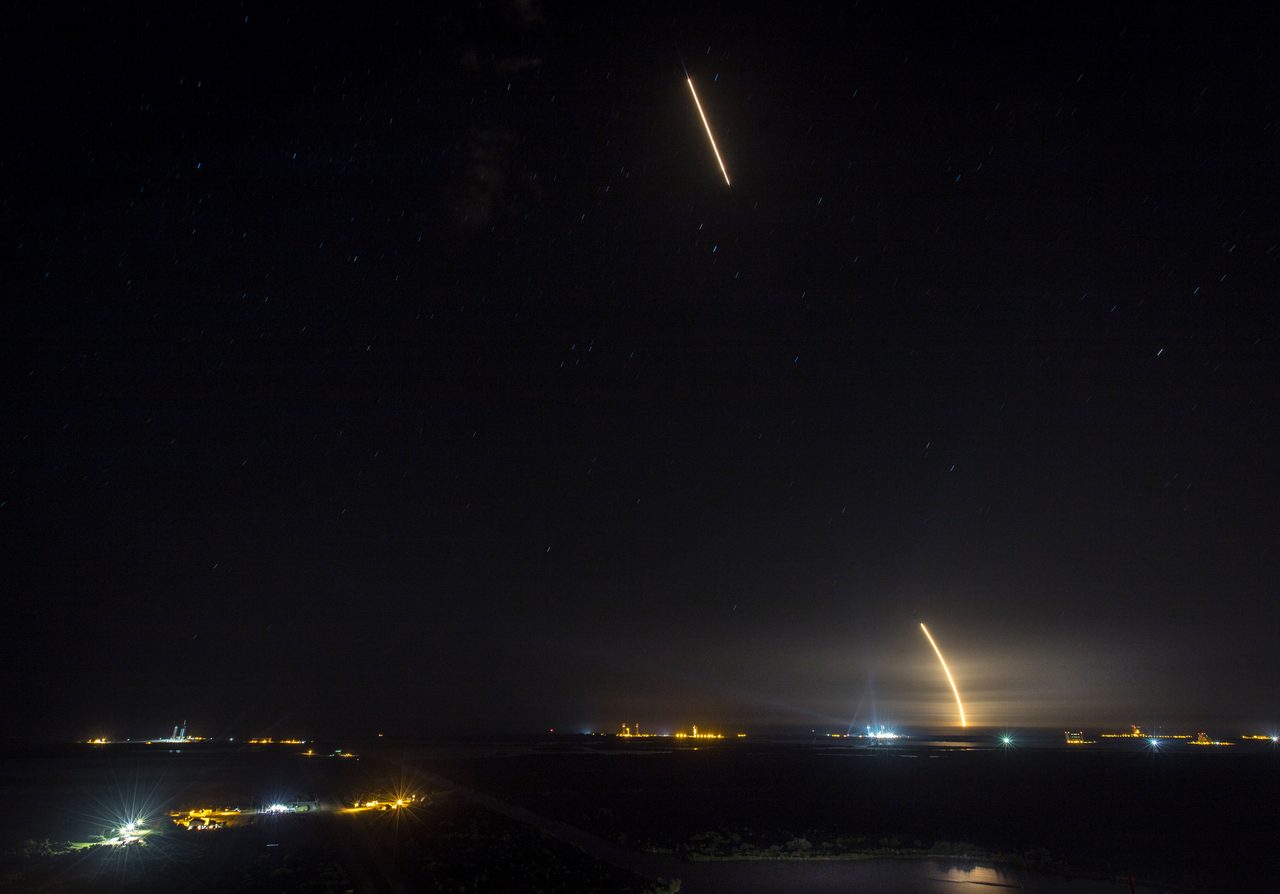 SpaceX CRS-17 rocket launching towards International Space Station under clear night sky.