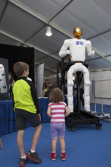 A variety of robotic rockets displayed at a rally, showcasing innovative designs and technology advancements.
