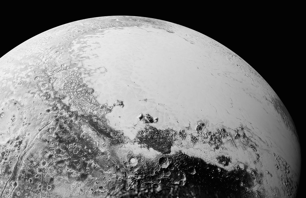 Detailed image of Pluto's surface captured by NASA's New Horizons, showcasing its complex geological features.