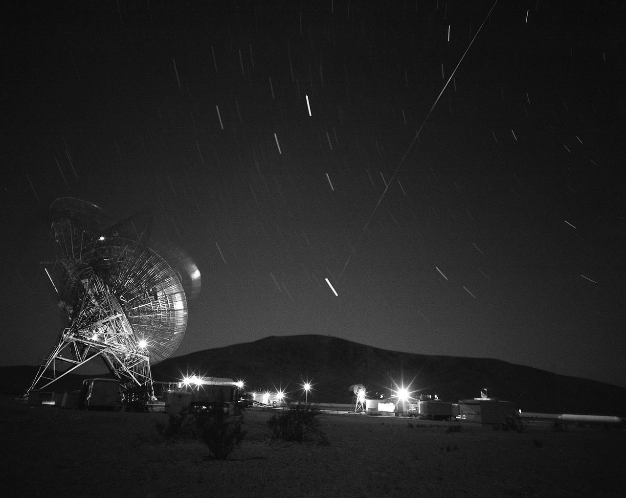 Archival photo of Echo 1 satellite over Goldstone Tracking Station, NASA's Jet Propulsion Laboratory, August 12, 1960.