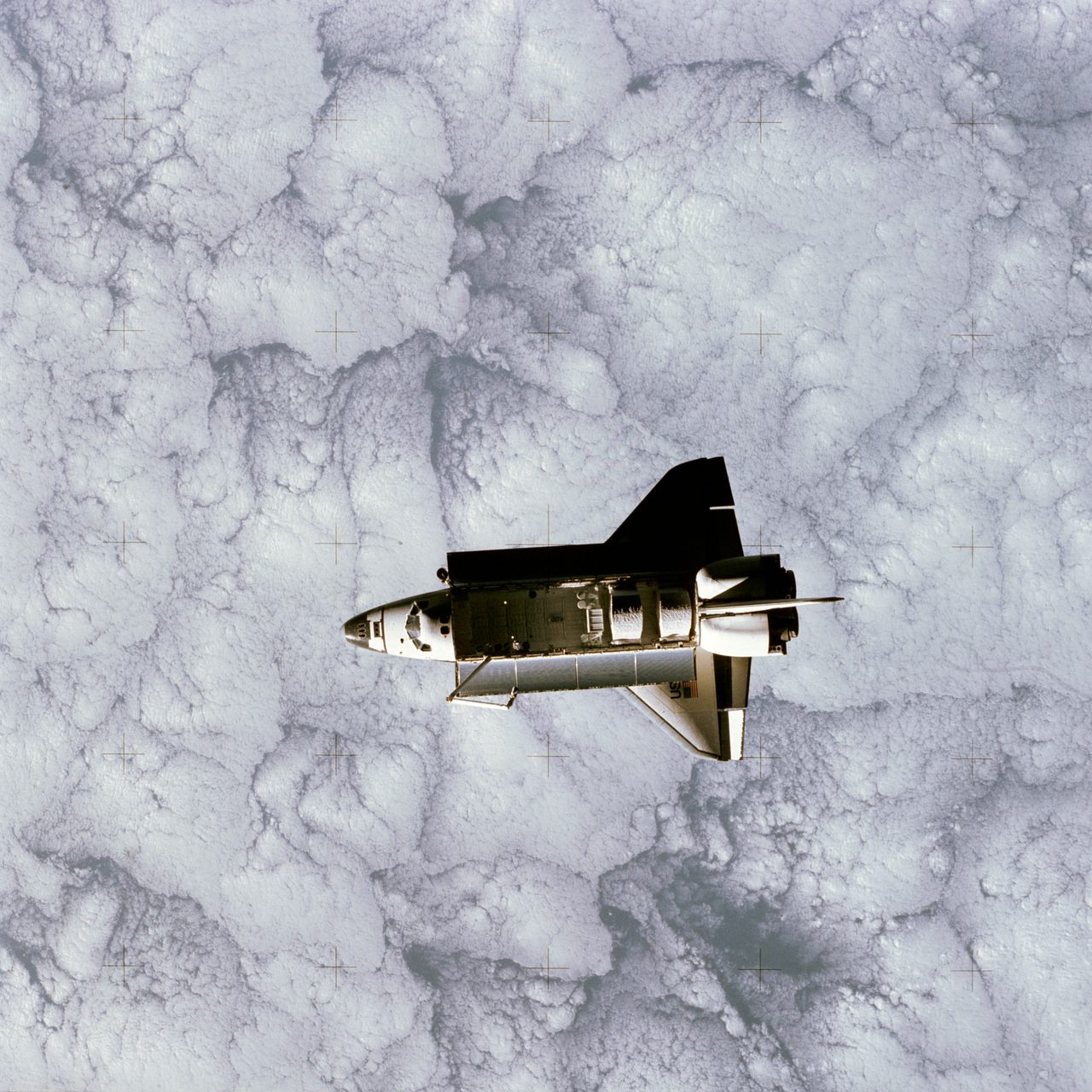 Space Shuttle Challenger viewed in orbit, captured by SPAS satellite against the backdrop of space.
