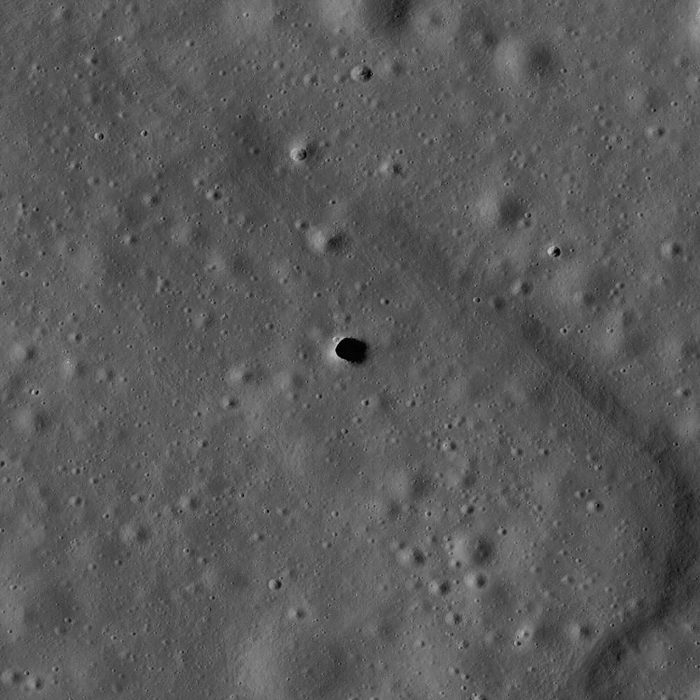 A possible skylight in a lunar lava tube, located in the Moon's ancient volcanic Marius Hills region.