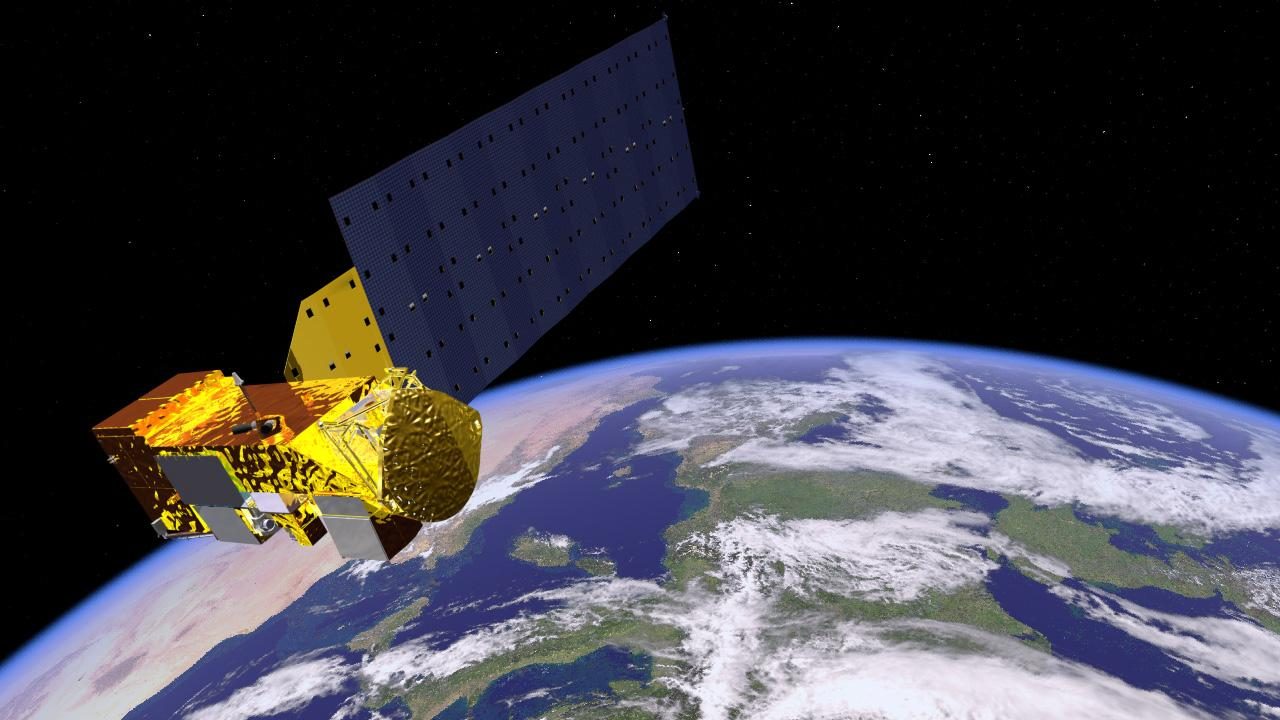 Artist's concept of NASA's Aqua satellite, equipped with six instruments, orbiting Earth in a near-polar path.