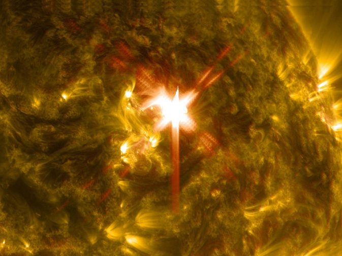 Bright X-class solar flare erupting from the sun's surface on March 29, 2014.