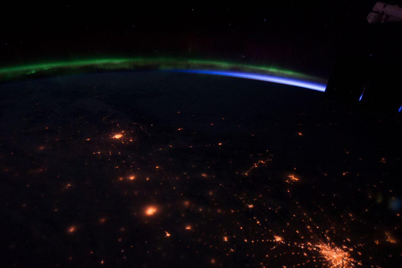 View of Earth from space captured by Expedition 35 crew, showcasing diverse landscapes and cloud formations.