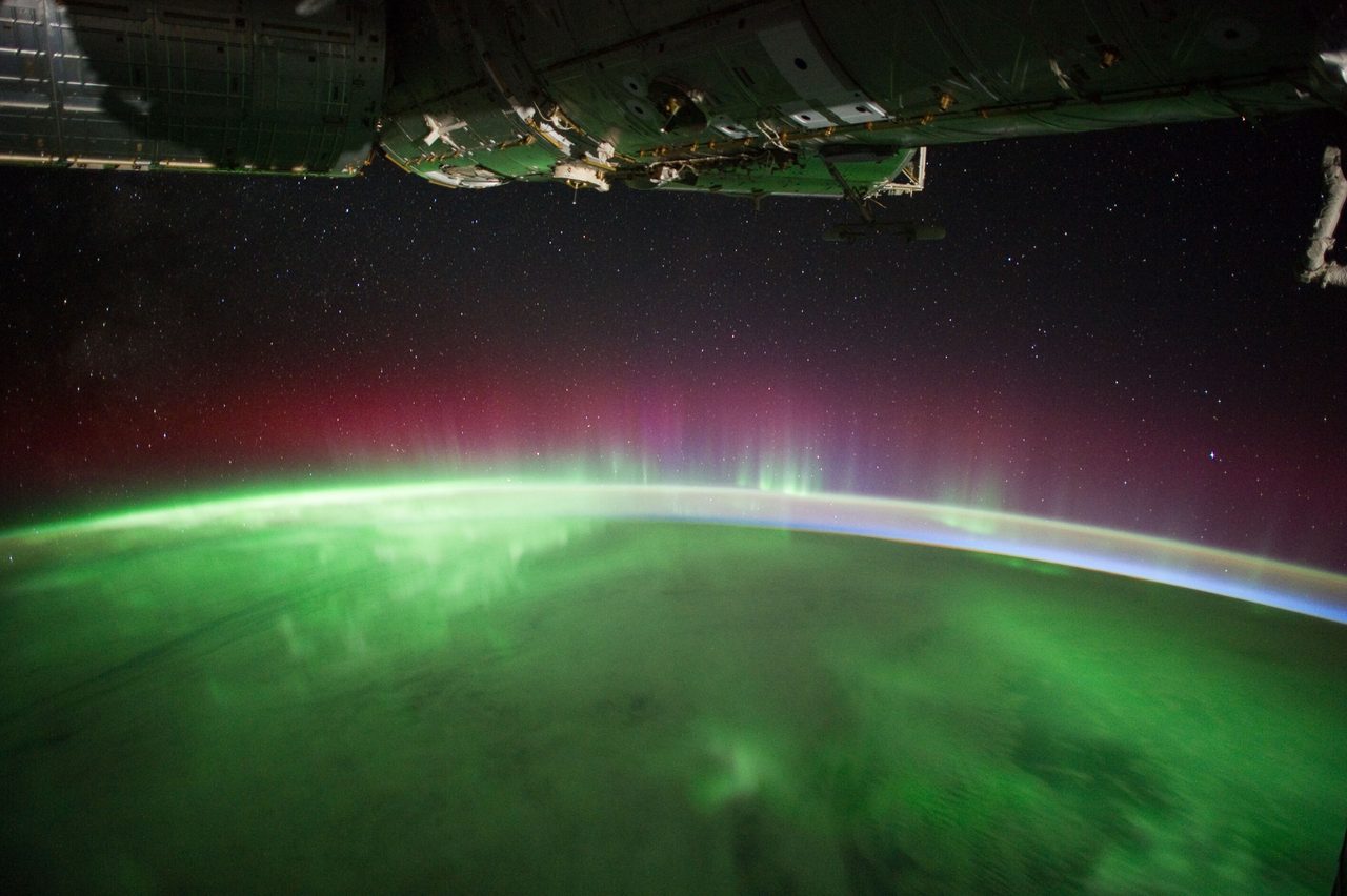 View of Earth from space captured by Expedition 30 crewmember, showing diverse landscapes and cloud formations.