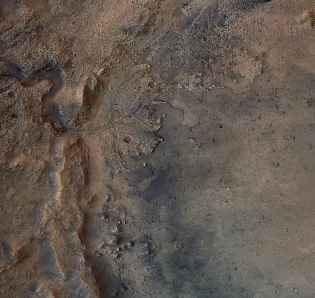 Aerial view of Jezero Crater's ancient delta, potential site for fossilized microbial life exploration.