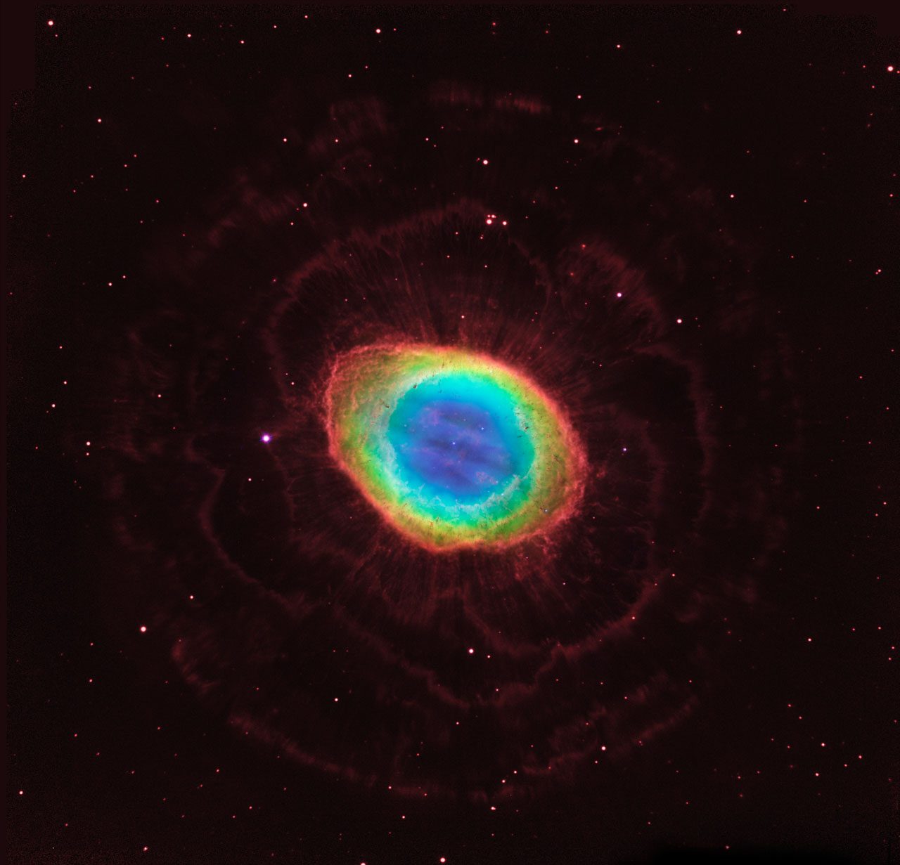 Hubble captures the Ring Nebula's complex structure with vivid colors and fine details.