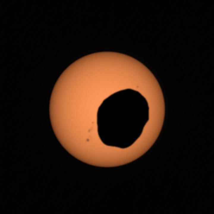 Perseverance rover's Mastcam-Z records Phobos partially covering the Sun in a Martian eclipse.