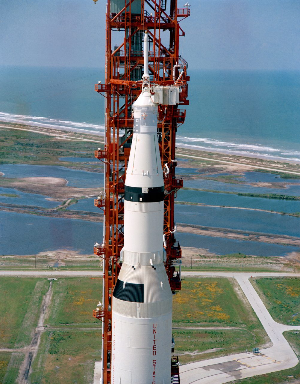 High-angle aerial view of Apollo 10 rocket on Pad B at Launch Complex 39, Kennedy Space Center.
