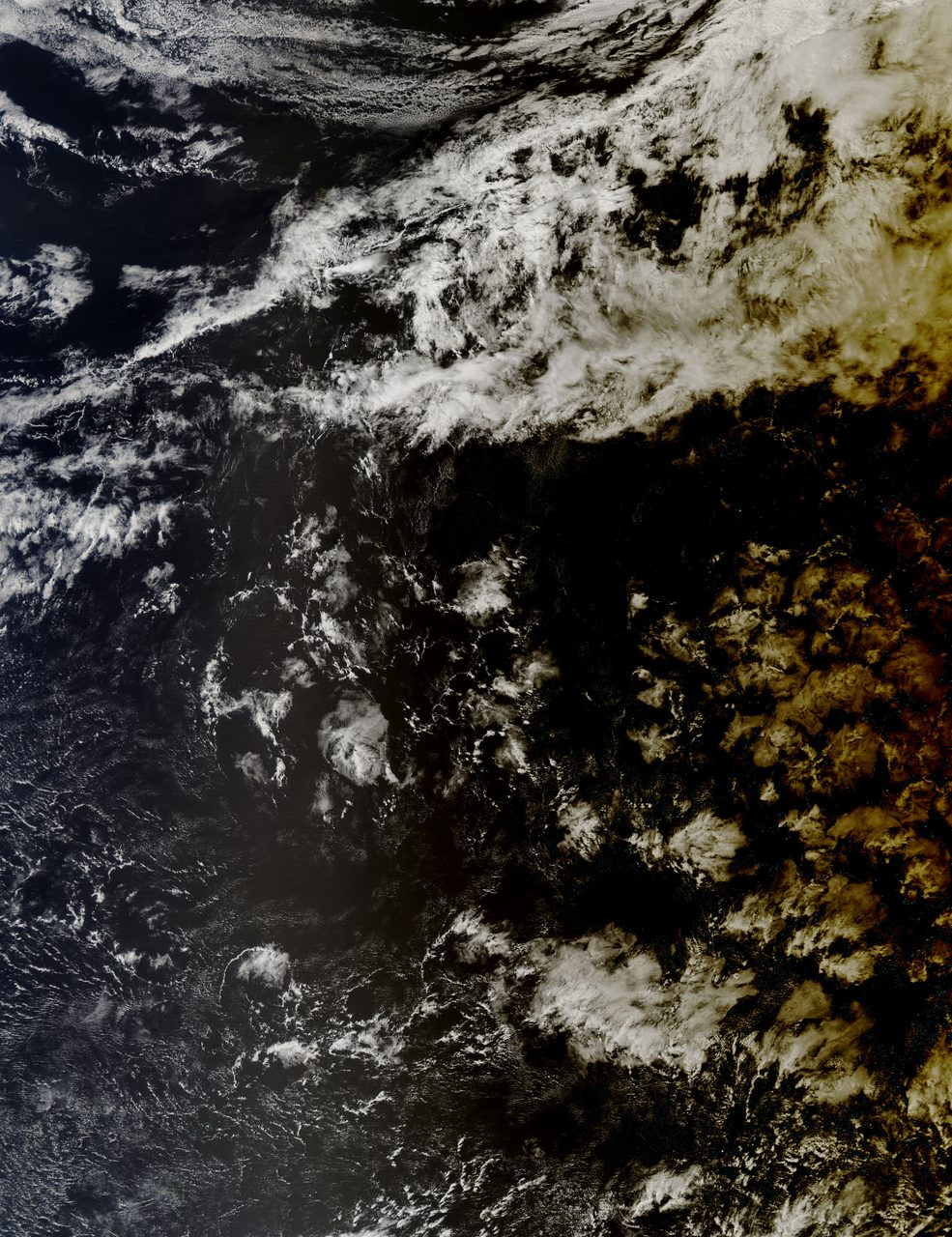 A solar eclipse casting a shadow over the vast expanse of the South Pacific Ocean.